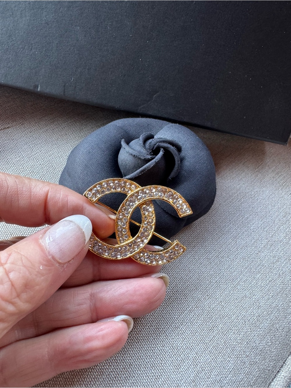 SOLD

CHANEL COMES WITH COA Crystal Gold-Plated Interlocking CC Brooch